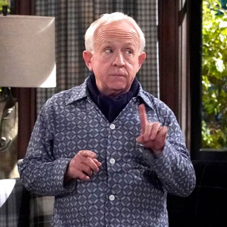 Leslie Jordan in his blue check shirt